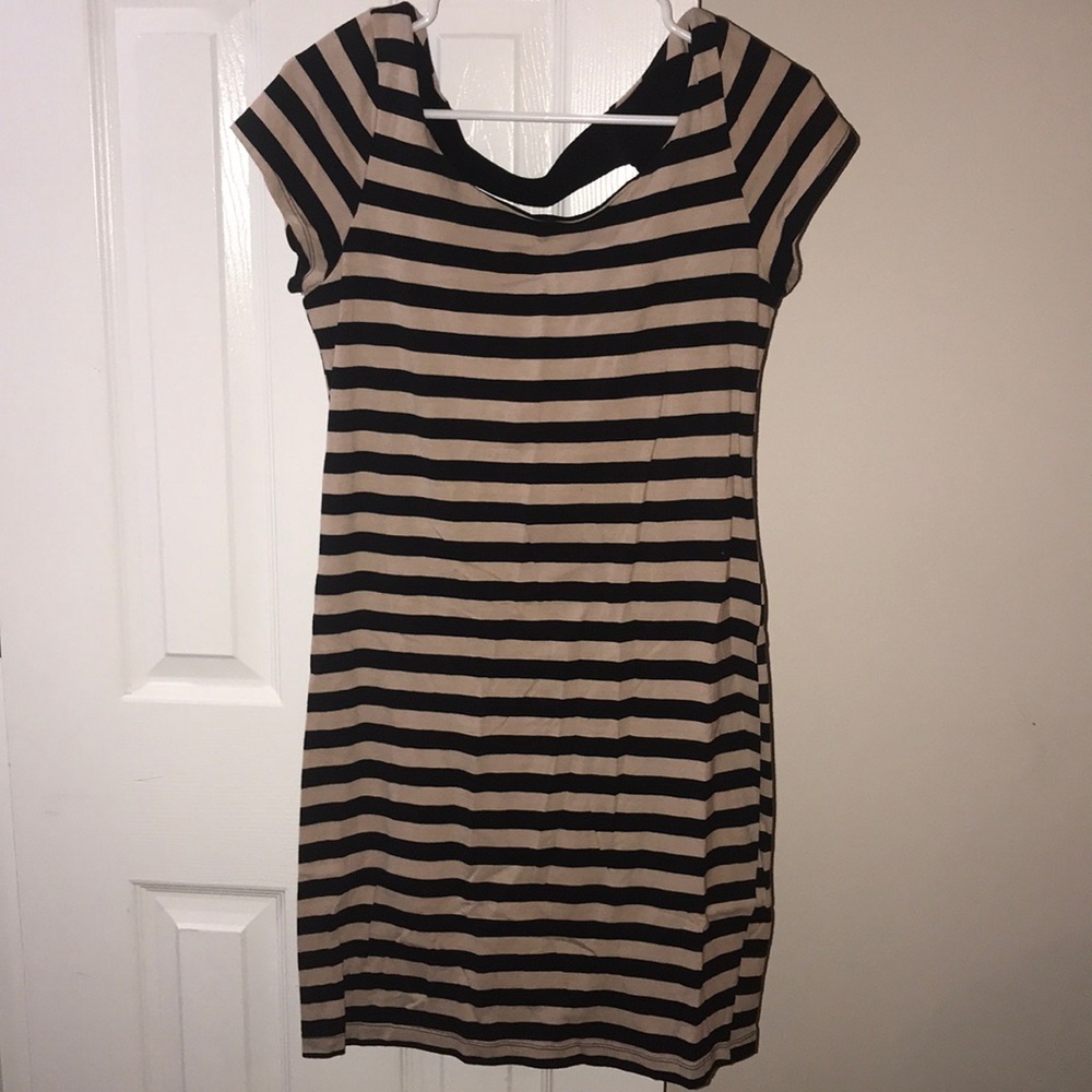 Casual or work dress with block straps in back!